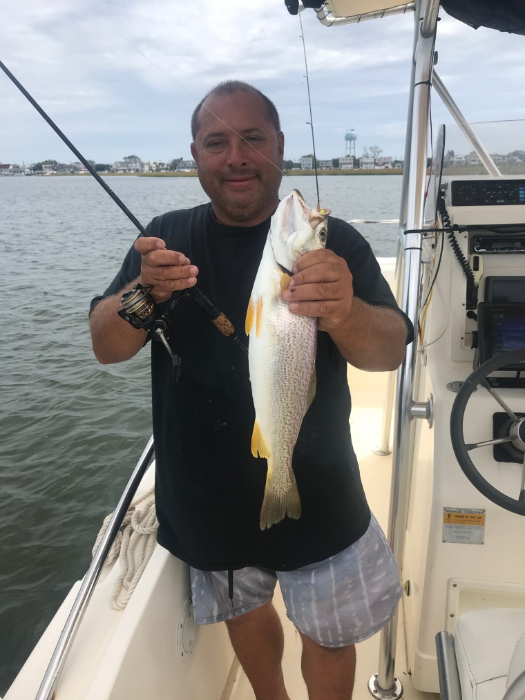 Dave with weakfish.jpg